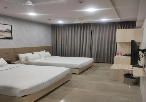 Twin Master Bed - Four Pax Room With Two Toilets Image