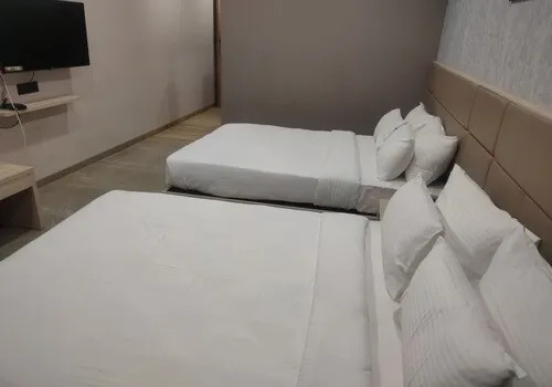 Twin Master Bed - Four Pax Room With Two Toilets Image